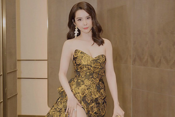 Hoa hậu Huỳnh Vy diện váy xẻ khoe chân dài